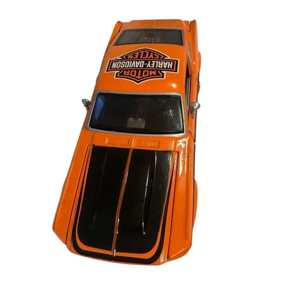 Harley-Davidson Black and Orange Toy Car